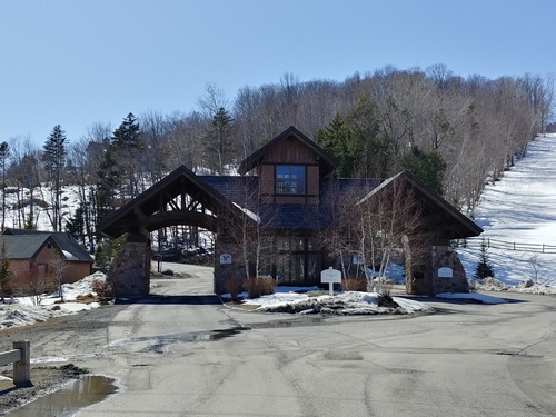 The Hermitage Club gatehouse and trails at Haystack mountain.
