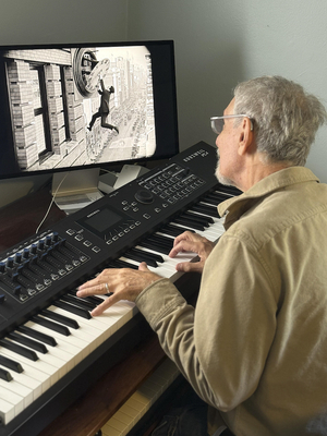 Rather than recreating the sound of early 20th century movie theaters, Tavalin uses a synthesizer and modern musical vocabulary to create a composition that blends with the action on screen.