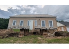 The 200-year-old Cross House, on Route 100, is getting a foundation, thanks to the work of owners Melissa and Shawn Hammond. The house has been in Melissa’s family for five generations.
Photo Mike Eldred
